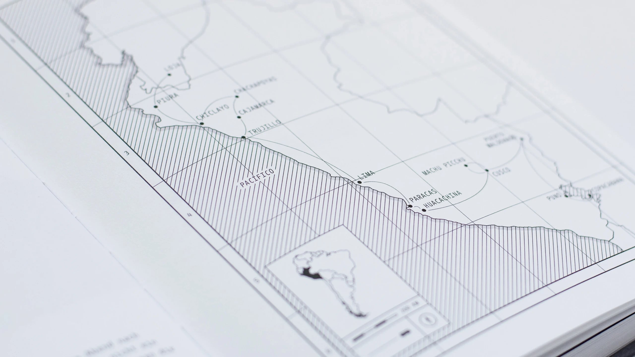 Detail of a printed route map, the Pacific coast of Peru drawn in fine hatching with Lima, Paracas, Huacachina and Machu Picchu marked